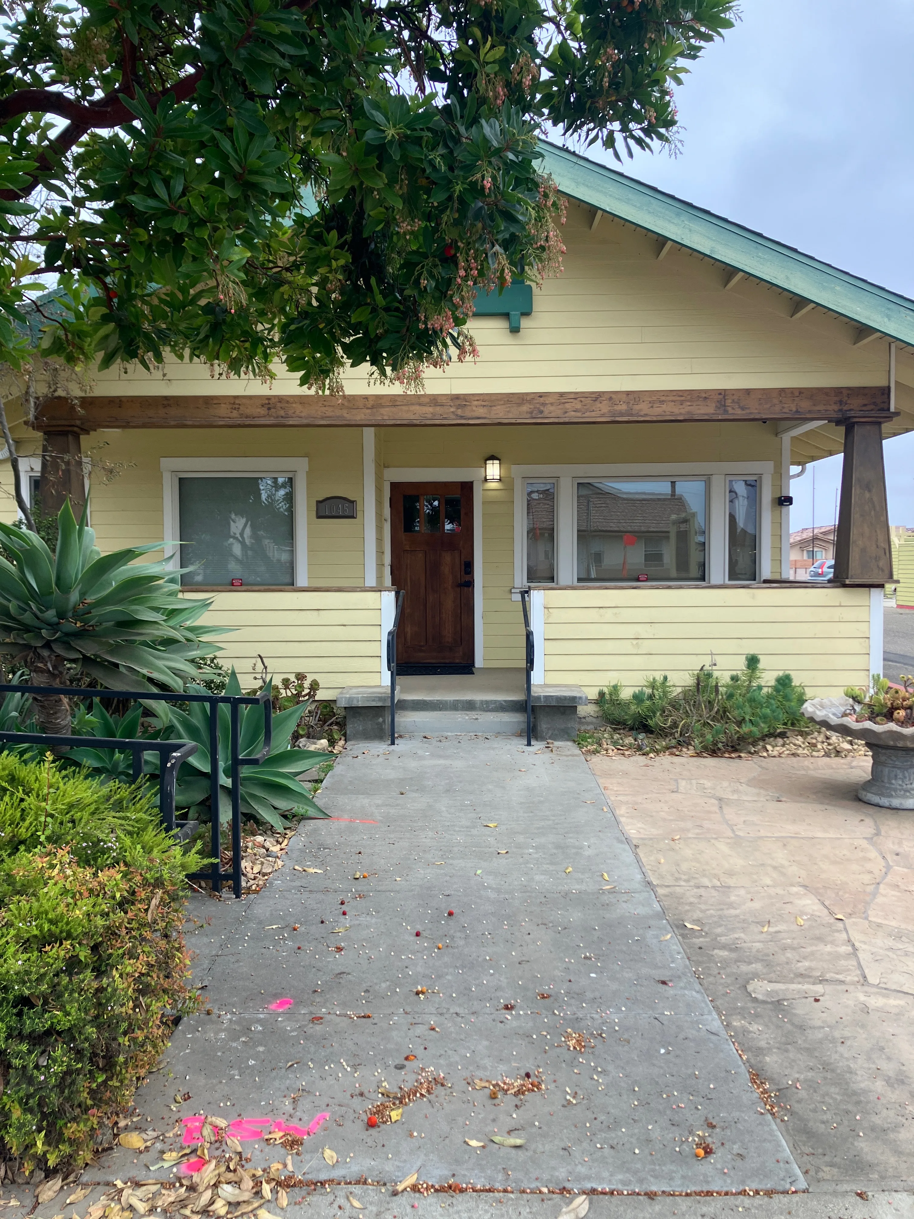 Front porch and entrance of The Yellow House Arts Academy